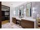 Elegant bathroom with dual vanities, great mirrors and countertop space, plus ample storage at 4915 Summit Overlook Dr, Las Vegas, NV 89135