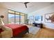 Modern bedroom with large windows and view of outdoor area at 4915 Summit Overlook Dr, Las Vegas, NV 89135