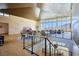 Open floor plan with high ceilings, large windows, and stunning mountain views at 4915 Summit Overlook Dr, Las Vegas, NV 89135