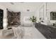 Modern bathroom featuring a soaking tub, walk-in shower, and dual vanities at 73 Princeville Ln, Las Vegas, NV 89113