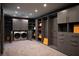 Organized walk-in closet with custom shelving and washer/dryer at 73 Princeville Ln, Las Vegas, NV 89113