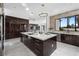 Modern kitchen with a large center island and stainless steel appliances at 73 Princeville Ln, Las Vegas, NV 89113
