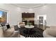 Stylish living room featuring modern furniture and a built-in wet bar at 73 Princeville Ln, Las Vegas, NV 89113