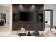 Spacious living room features a built-in media center and views of other areas at 73 Princeville Ln, Las Vegas, NV 89113