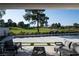 Inviting covered patio featuring comfortable seating and scenic views of the lush green golf course at 73 Princeville Ln, Las Vegas, NV 89113