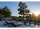 Stunning pool with golf course views and mature landscaping at 73 Princeville Ln, Las Vegas, NV 89113