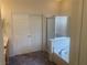 Bathroom features a shower, tub, and double doors at 8273 Jo Marcy Dr, Las Vegas, NV 89131