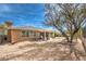 Backyard of home featuring desert landscaping, a patio, and desert views at 10909 Bramante Dr, Las Vegas, NV 89141