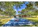 A well-maintained community park offers various play areas and mature shade trees for community enjoyment at 10909 Bramante Dr, Las Vegas, NV 89141