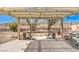 Covered patio features an outdoor seating area and mountain views at 10909 Bramante Dr, Las Vegas, NV 89141