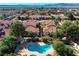 Inviting community pool and spa surrounded by lush landscaping at 6739 W Charleston Blvd # 4, Las Vegas, NV 89146