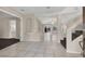 Bright and spacious entryway with tile floors and a staircase at 10914 Fintry Hills St, Las Vegas, NV 89141