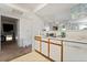 Kitchen features white cabinets, a sink and dishwasher at 2300 E Silverado Ranch Blvd # 1165, Las Vegas, NV 89183