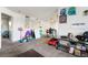 Living room with various items and a partial kitchen view at 2300 E Silverado Ranch Blvd # 1165, Las Vegas, NV 89183