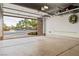 Spacious garage with overhead storage racks, ready for your vehicles and hobbies at 7380 Abundant Harvest Ave, Las Vegas, NV 89131