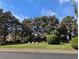 Green lawn area with trees and seating at 2851 S Valley View Blvd # 1119, Las Vegas, NV 89102