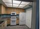 Well-equipped community kitchen with appliances at 2851 S Valley View Blvd # 1119, Las Vegas, NV 89102
