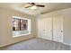 Spacious bedroom with vaulted ceiling, window seat, and large closet at 578 Cervantes Dr, Henderson, NV 89014