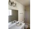 Clean bathroom includes a vanity, mirror, and shower-tub combination at 2004 Mesquite Ln # 201, Laughlin, NV 89029