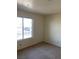 Well lit bedroom with a large window and neutral carpet at 2004 Mesquite Ln # 201, Laughlin, NV 89029
