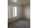 Comfortable bedroom with a window for natural light and neutral walls at 2004 Mesquite Ln # 201, Laughlin, NV 89029