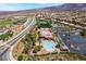 This aerial shows the community pool, amenities, manicured landscaping, and ample parking at 2804 Josephine Dr, Henderson, NV 89044