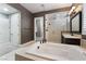 A well-appointed bathroom with a soaking tub and a frameless glass shower at 2804 Josephine Dr, Henderson, NV 89044