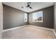 Bedroom with ceiling fan, carpet, and window with window shutters at 2804 Josephine Dr, Henderson, NV 89044
