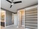 Bedroom with large closet, access to a bathroom and staircase at 2804 Josephine Dr, Henderson, NV 89044