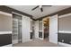 A bedroom with closet space leading to a bathroom with dual vanities and open doorways at 2804 Josephine Dr, Henderson, NV 89044