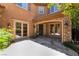 Front courtyard with tiled floor, stone accents, and dual entry doors at 2804 Josephine Dr, Henderson, NV 89044
