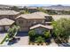 Two-story home with lush front yard landscaping and a tile roof at 2804 Josephine Dr, Henderson, NV 89044