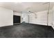 A clean and spacious three car garage with a finished floor at 2804 Josephine Dr, Henderson, NV 89044
