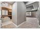 Hallway leading to the bathroom, with a soaking tub and tiled floors at 2804 Josephine Dr, Henderson, NV 89044