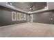 Large main bedroom with tray ceilings, neutral carpet, recessed lighting, and plantation shutters at 2804 Josephine Dr, Henderson, NV 89044