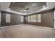 Spacious main bedroom with tray ceilings, plantation shutters, and neutral carpet at 2804 Josephine Dr, Henderson, NV 89044