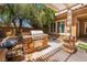Outdoor kitchen has built in BBQ, sink, prep area and flagstone tile at 2804 Josephine Dr, Henderson, NV 89044