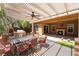 Beautiful outdoor patio with a built-in grill and a stylish pergola, perfect for entertaining at 2804 Josephine Dr, Henderson, NV 89044