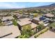 An aerial view features the home's tile roof, mature landscaping, and backyard at 2804 Josephine Dr, Henderson, NV 89044