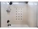 Bright and modern shower with tiled walls, decorative inset, and updated fixtures at 2804 Josephine Dr, Henderson, NV 89044