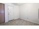 This bedroom features neutral walls and tile flooring throughout the room at 3843 Terrazzo Ave # 0, Las Vegas, NV 89115
