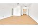 Bright bedroom with hardwood floors, white walls, and walk-in closet at 6615 Whispering Sands Dr, Las Vegas, NV 89131