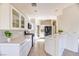 Spacious kitchen with white cabinets and tile countertops at 2345 Silver Crew Pass, Henderson, NV 89052