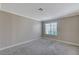 Neutral toned bedroom with large window for natural light and comfortable carpet at 4860 Nara Vista Way # 104, Las Vegas, NV 89103