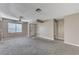 Neutral living room features new carpet, ceiling fan and bright natural light at 4860 Nara Vista Way # 104, Las Vegas, NV 89103
