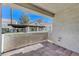 Private covered patio with views of the community clubhouse and mature landscaping at 4860 Nara Vista Way # 104, Las Vegas, NV 89103