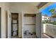 Outdoor storage closet featuring water heater, shelving, and storage for tools and household items at 4860 Nara Vista Way # 104, Las Vegas, NV 89103