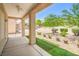 Cozy covered back patio with low maintenance yard at 7625 Fieldfare Dr, North Las Vegas, NV 89084