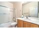 Bathroom features a shower-tub combo and a sink at 7625 Fieldfare Dr, North Las Vegas, NV 89084