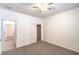 Bright carpeted bedroom with closet space at 7625 Fieldfare Dr, North Las Vegas, NV 89084